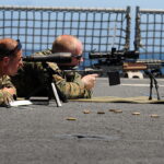 1200px US Navy 100712 N 7948R 184 Marines practice firing their weapon aboard USS Pearl Harbor - voozon.com